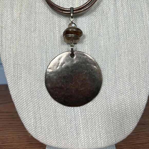 Chico’s Brass hammered pendant w/beaded accent on 17” leather strap & expander - Picture 2 of 7